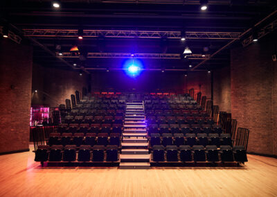 Gosforth Civic Theatre theatre seating with projector shining in the background